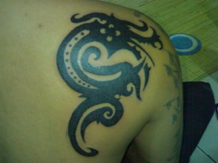 Celebrity Back Dragon Tattoo